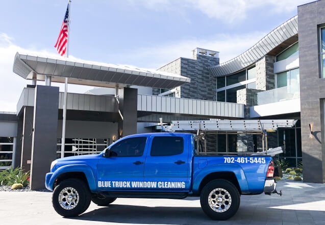 Blue Truck Window Cleaning Parked Truck